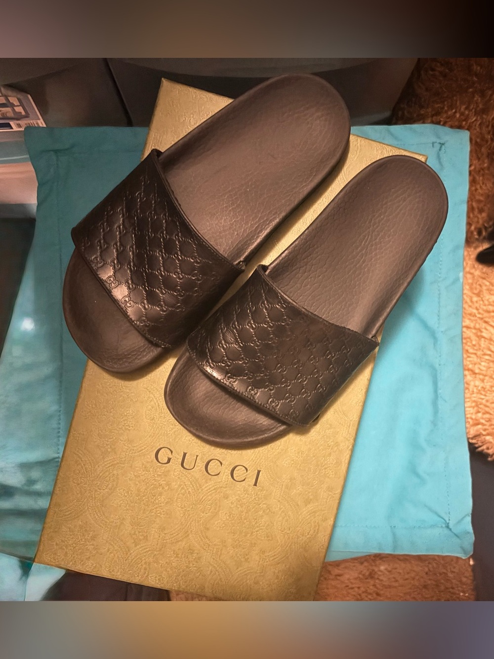 Gucci Black Embossed Logo Slide Sandals
